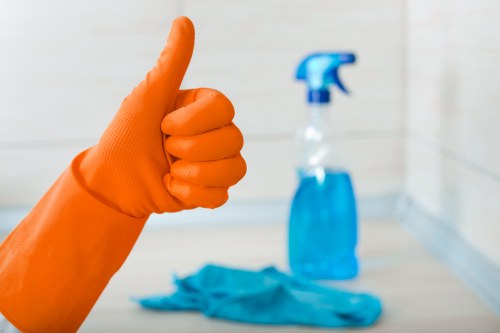 Technician reviewing cleaning products and safety procedures